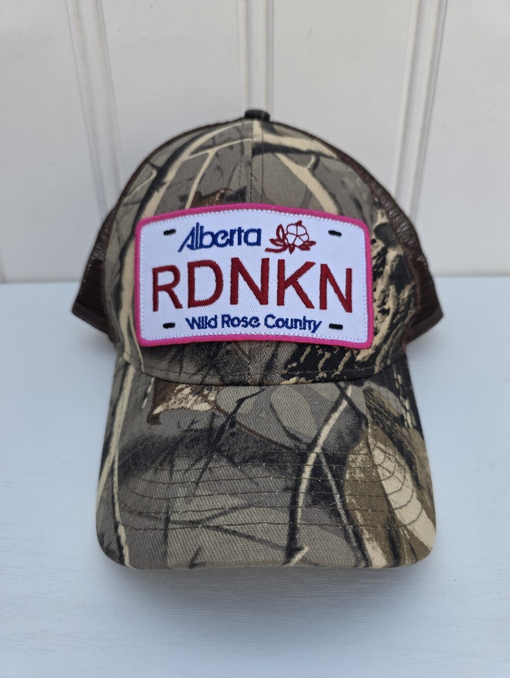 RDNKN Alberta Licence Plate Trucker Cap Camo Green Pink